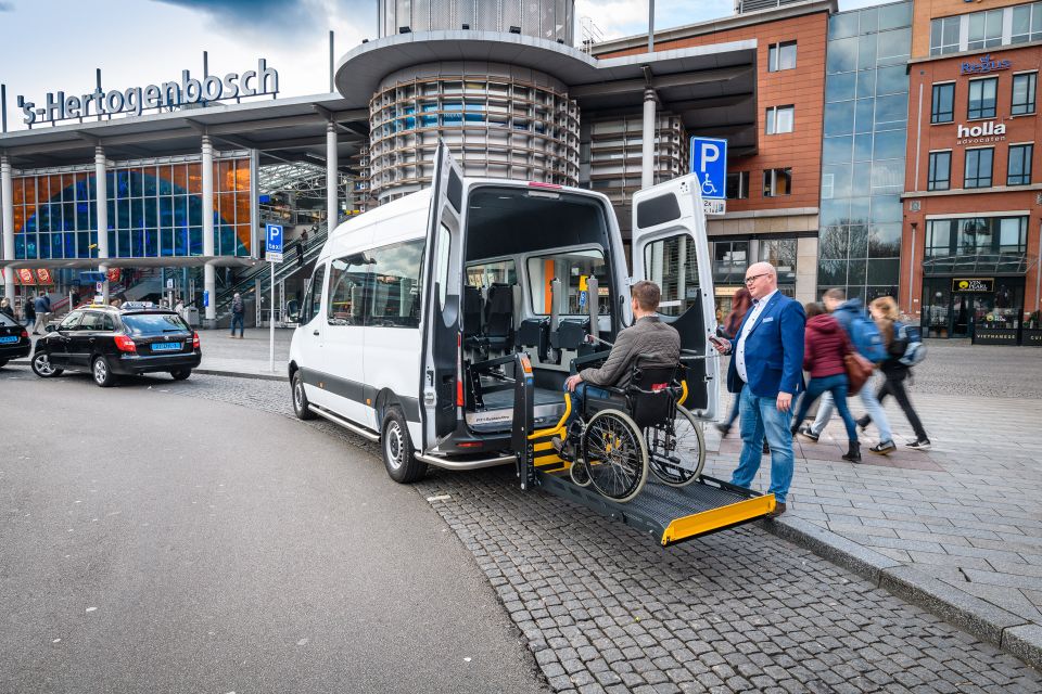 Wheelchair passengers enter the Ford Transit L3 